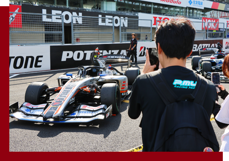 A chance to see the machines up close! Parc Fermé Walk
