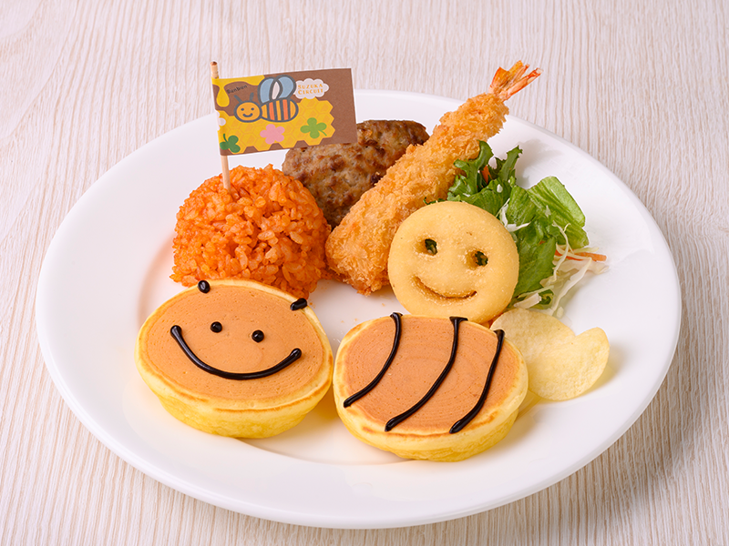 Menu for ages 3 to 5 featuring smiley face pancakes and rice balls